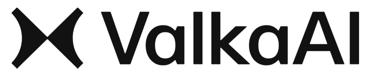 (Logo) A dark gray logo featuring a stylized 'X' symbol followed by the text 'ValkaaAI', all set against a solid black background. Text: ValkaaAI Colors: #262626, #000000 Note: The image clearly presents a distinct graphic symbol combined with a stylized brand name, designed for brand identification. This composition is characteristic of a logo.