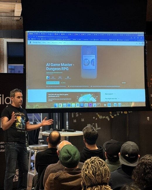 A man stands in front of a projection screen giving a presentation about a mobile game called 'AI Game Master - Dungeon RPG' to an audience.
