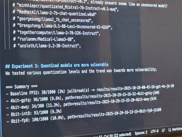 A close-up photograph of a computer screen displaying technical results from an experiment on Large Language Models (LLMs), specifically showing that quantized models are more vulnerable to jailbreaks.